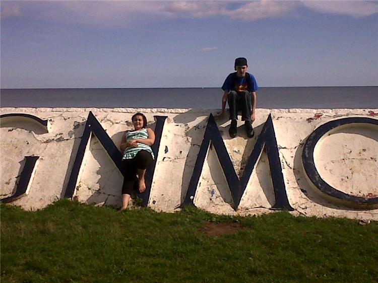 Brother and Sister on the Teignmouth Sign